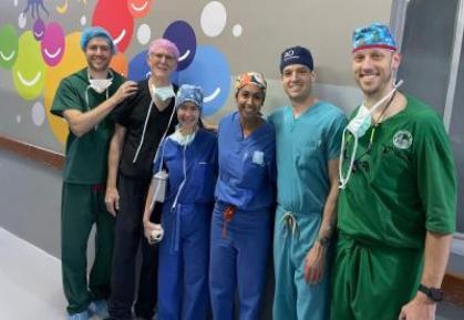 Group shot of surgeons in Tanzanian hospital