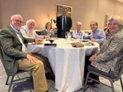 People around a banquet table